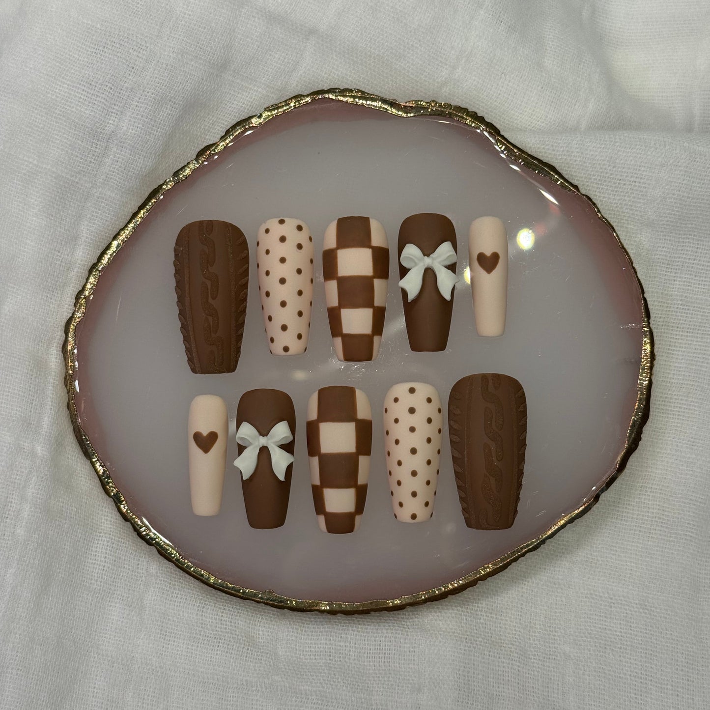 handmade brown & cream press on nails with sweater design & bow charms