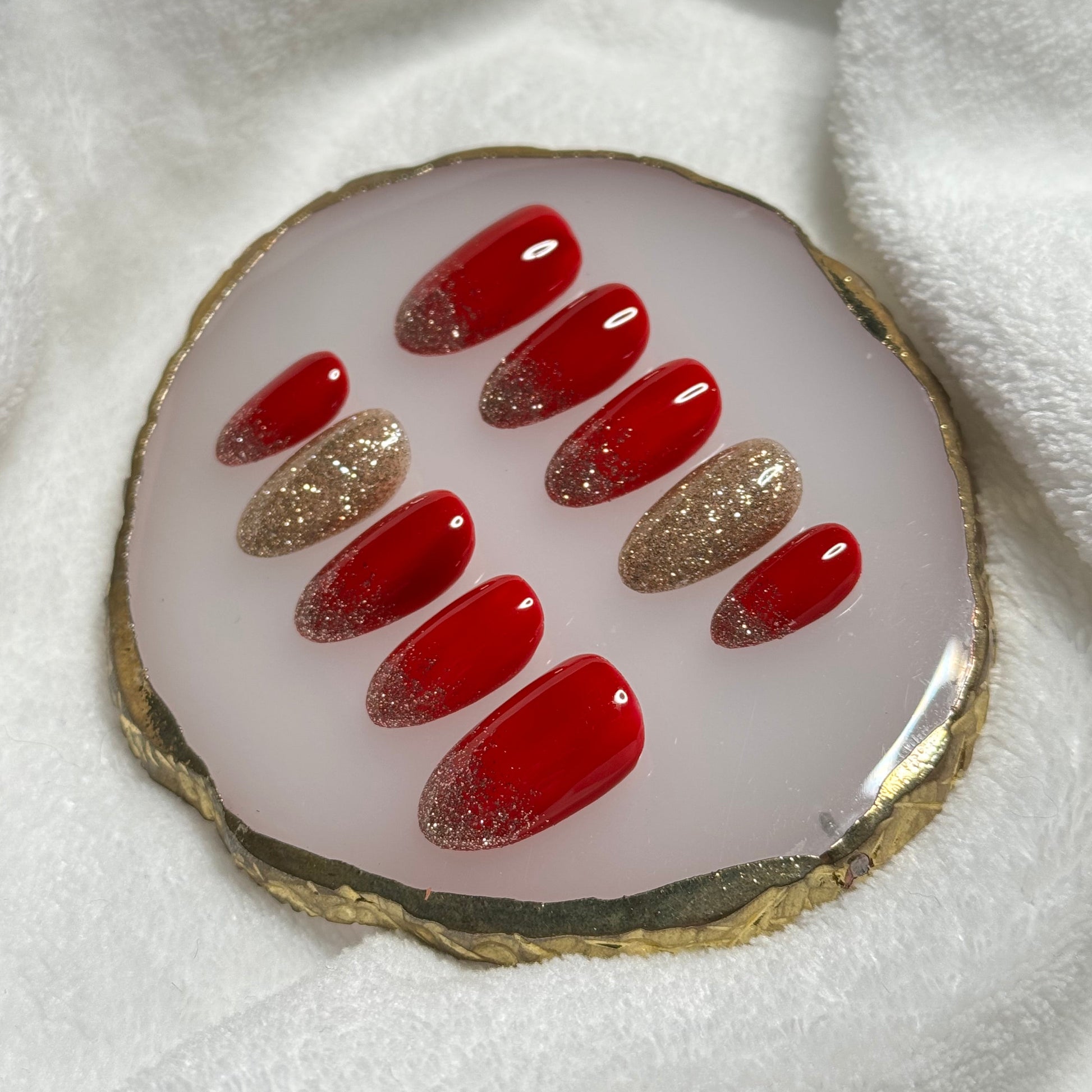 handmade holiday red press on nails with golden sparkly accents, durable, easy at-home manicure