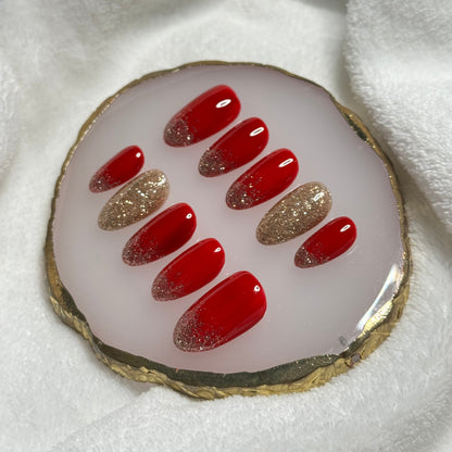 handmade holiday red press on nails with golden sparkly accents, durable, easy at-home manicure