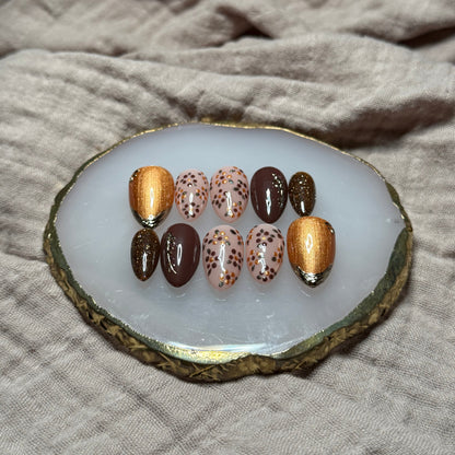 handmade deep maroon and shimmery orange press on nails with floral, chrome and sparkle accents, reusable, custom handmade press on nails, easy at-home manicure