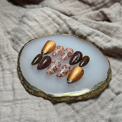 handmade deep maroon and shimmery orange press on nails with floral, chrome and sparkle accents, reusable, custom handmade press on nails, easy at-home manicure