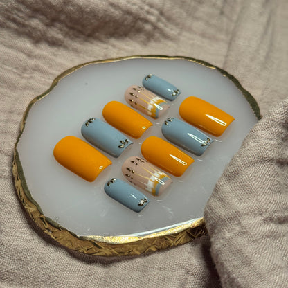 handmade burnt orange and blue-ish grey press on nails with golden chrome accents, reusable, custom handmade press on nails, easy at-home manicure