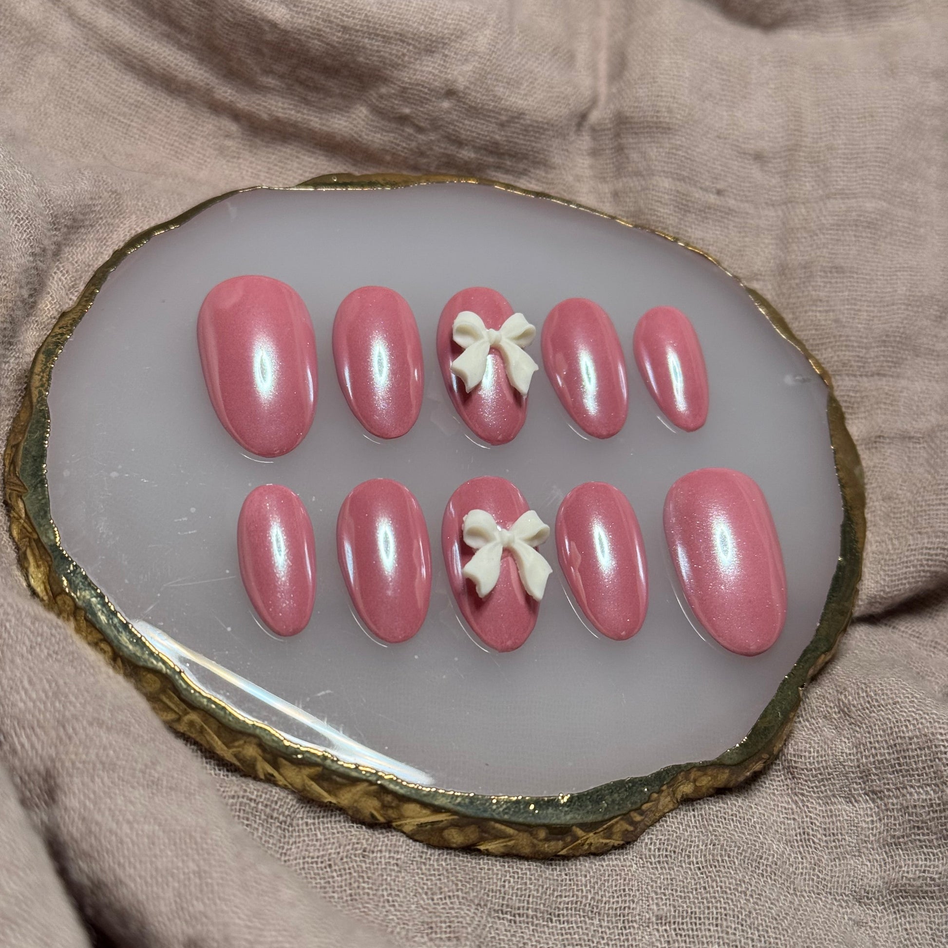 handmade pink chrome press on nails with ivory bow accent nails, reusable, custom handmade press on nails, easy at-home manicure