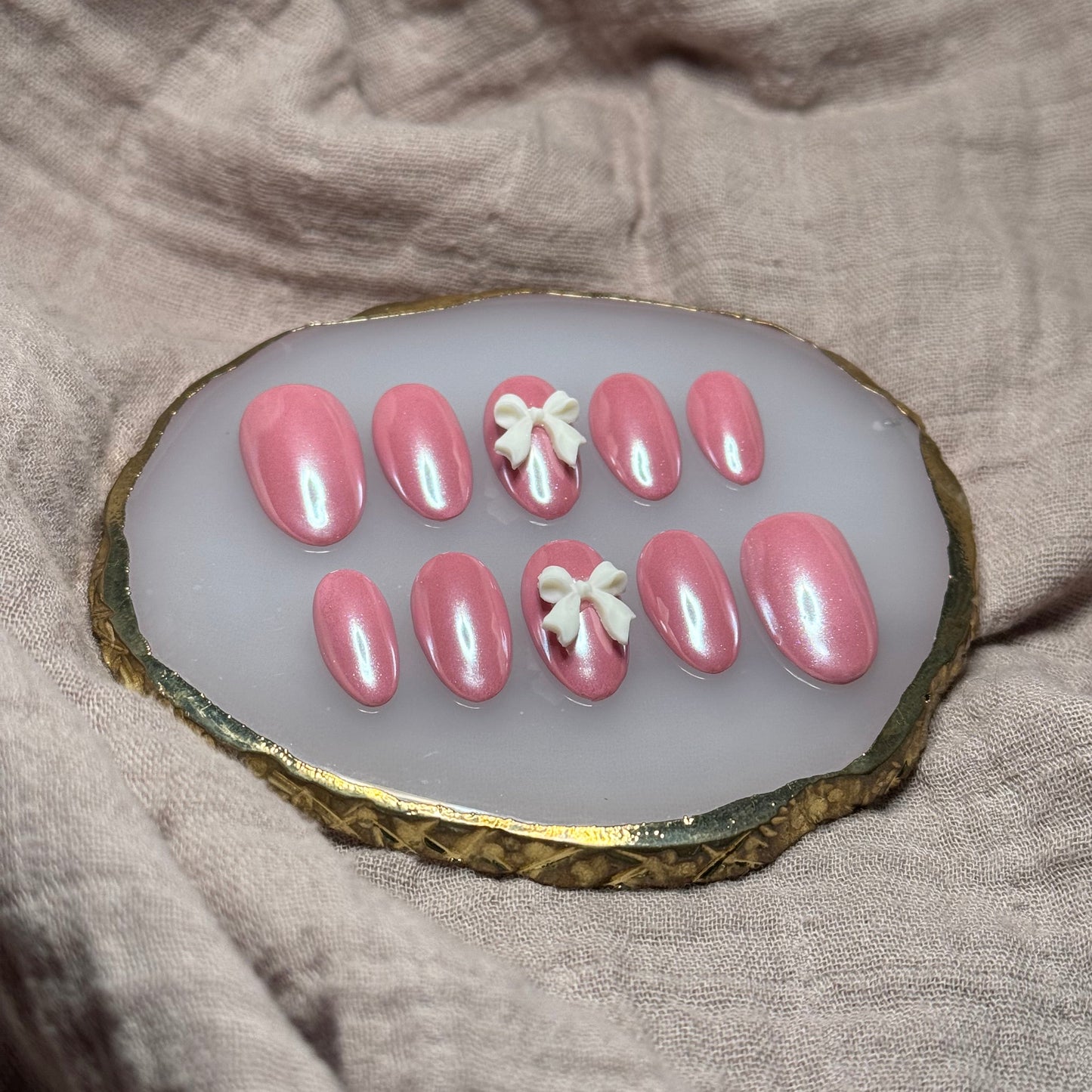 handmade pink chrome press on nails with ivory bow accent nails, reusable, custom handmade press on nails, easy at-home manicure