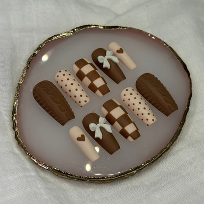 handmade brown & cream press on nails with sweater design & bow charms