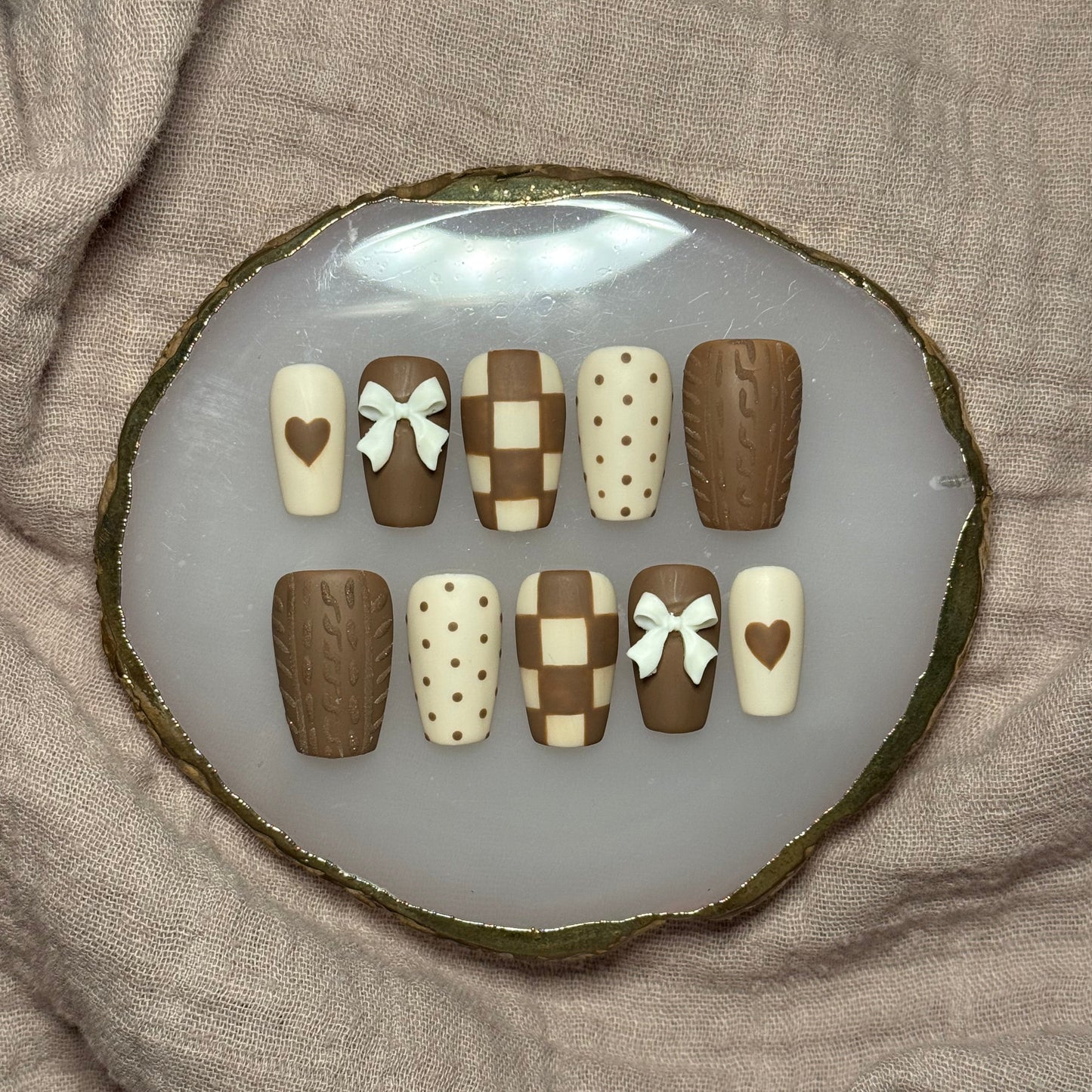 handmade brown & cream press on nails with sweater design & bow charms