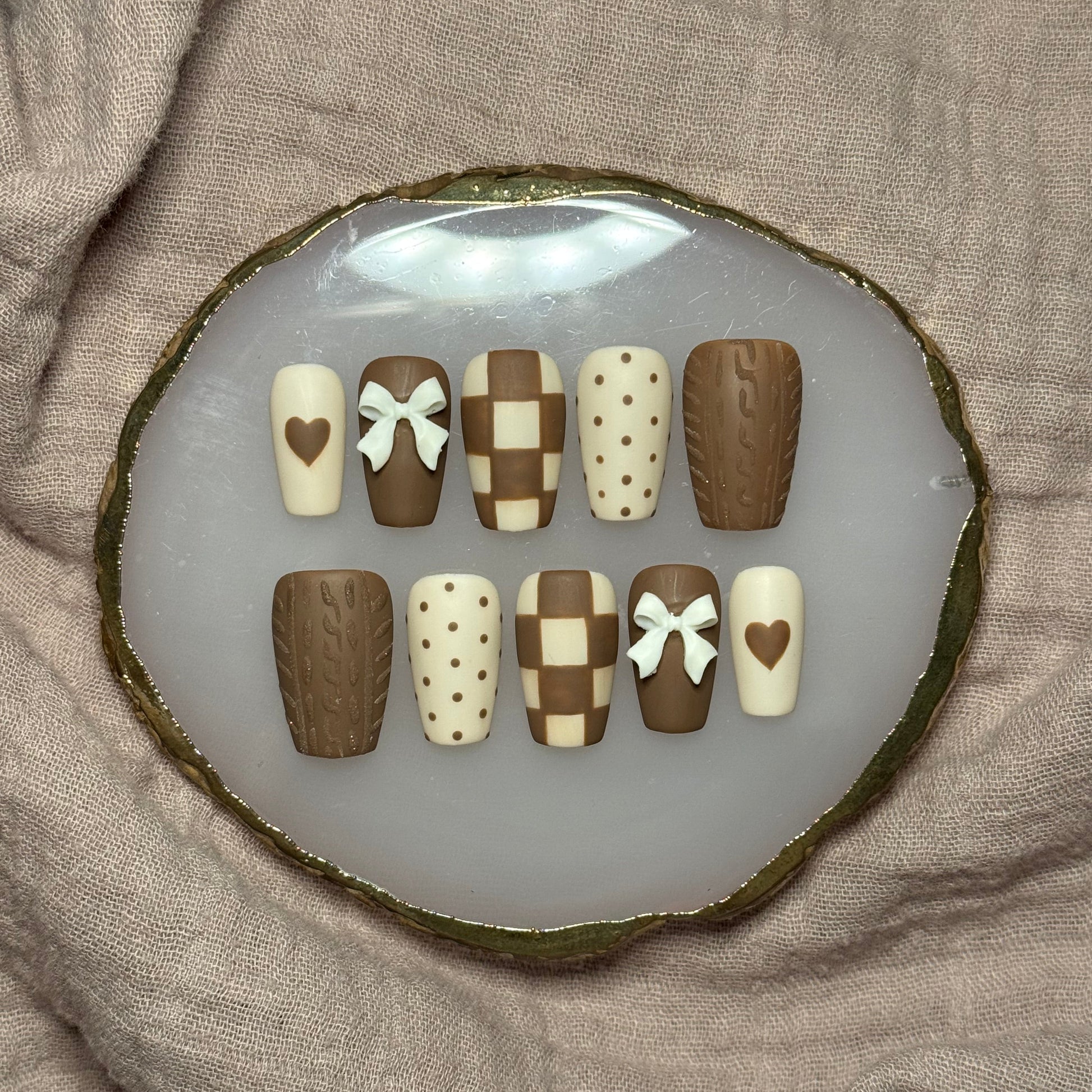 handmade brown & cream press on nails with sweater design & bow charms