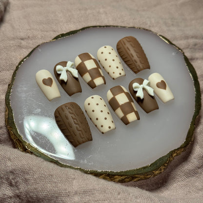 handmade brown & cream press on nails with sweater design & bow charms