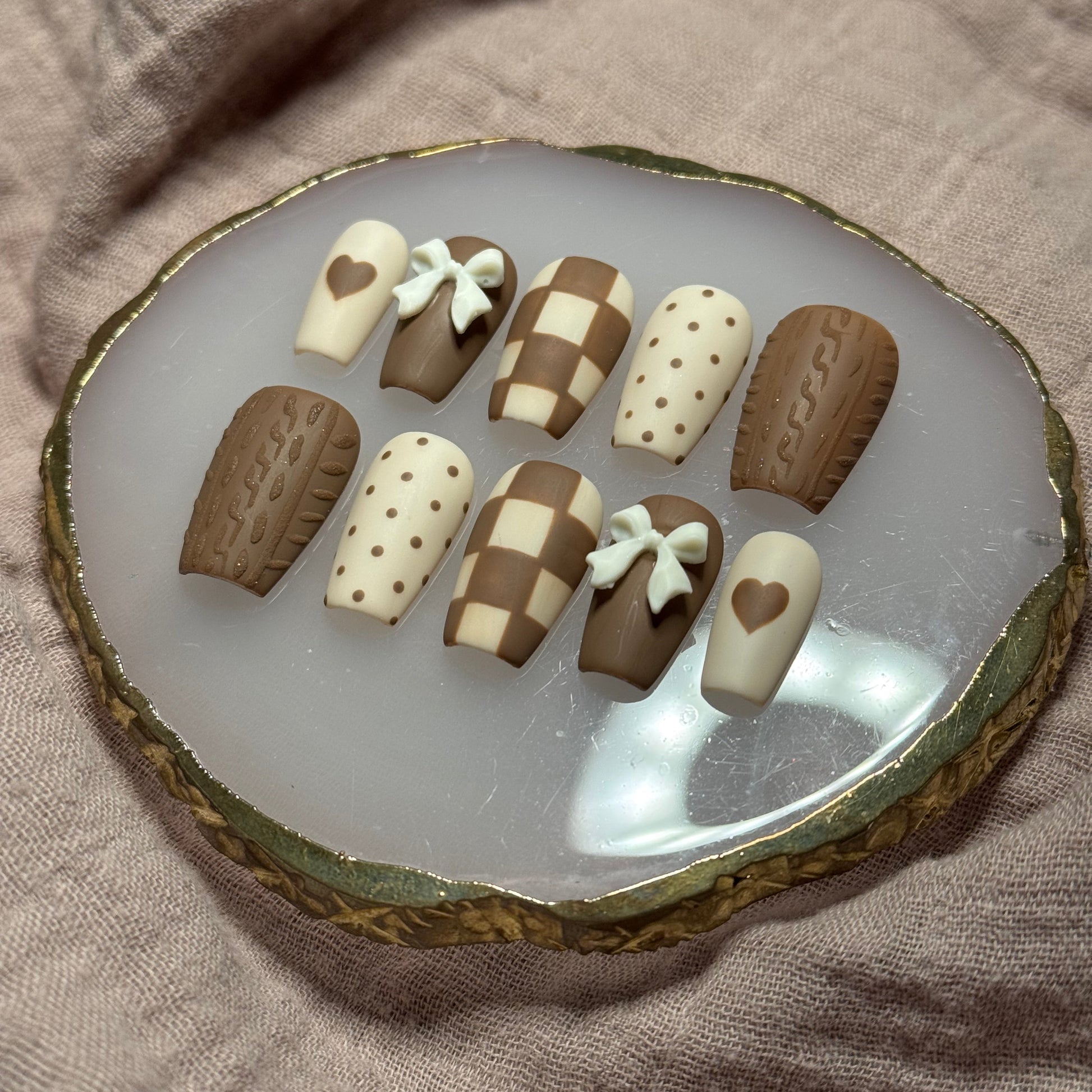 handmade brown & cream press on nails with sweater design & bow charms